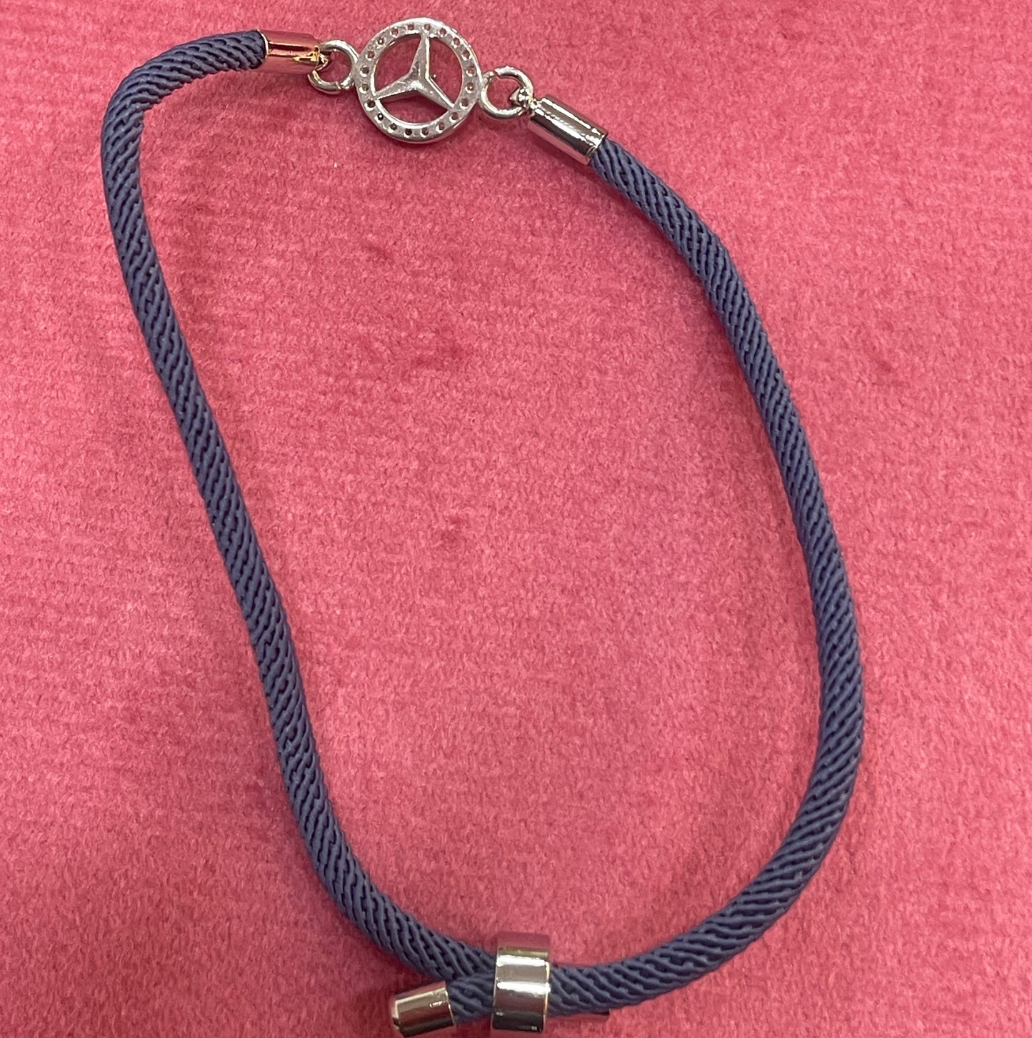 Silver-Plated Rakhi for Brother | CZ Mercedes Logo Charm on Navy Blue Silk Thread