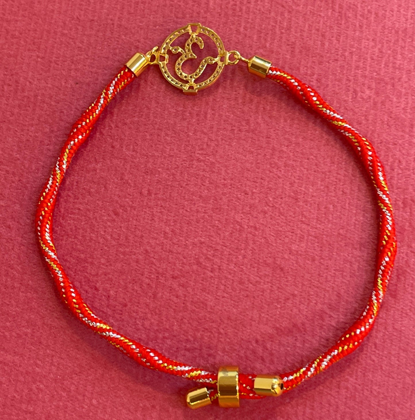 Silver Om Rakhi for Brother | Gold Plated Full CZ Om Charm on Red & Gold Twisted Thread