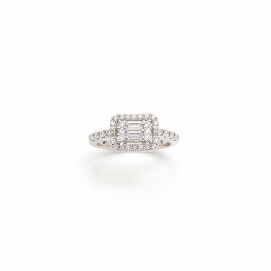 Diamond ring on a blue textured surface