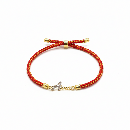 Gold-Plated Rakhi for Sister | CZ Butterfly Charm on Red Braided Silk Thread