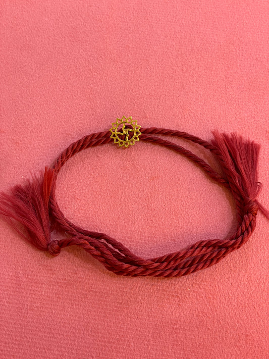 Gold Plated Swastik Rakhi for Brother | Silver Charm with Maroon Thread