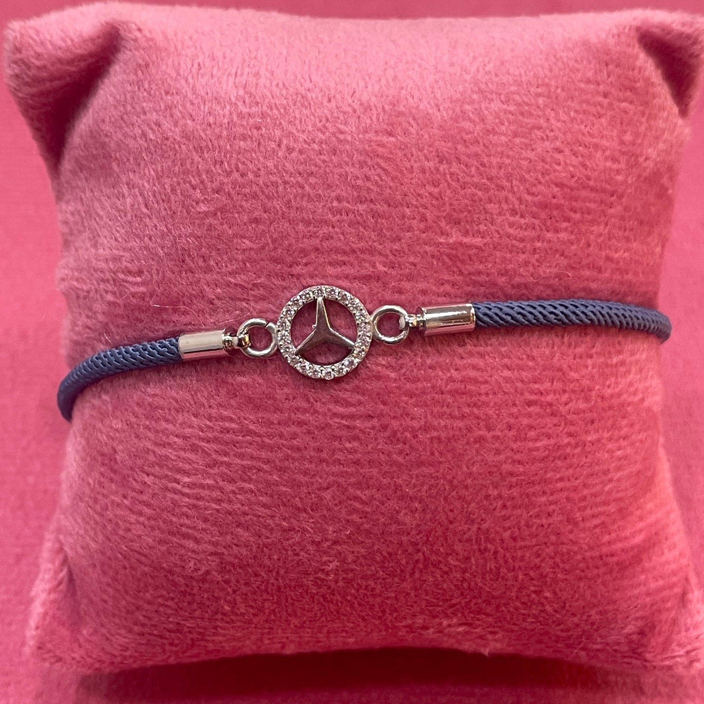 Silver-Plated Rakhi for Brother | CZ Mercedes Logo Charm on Navy Blue Silk Thread