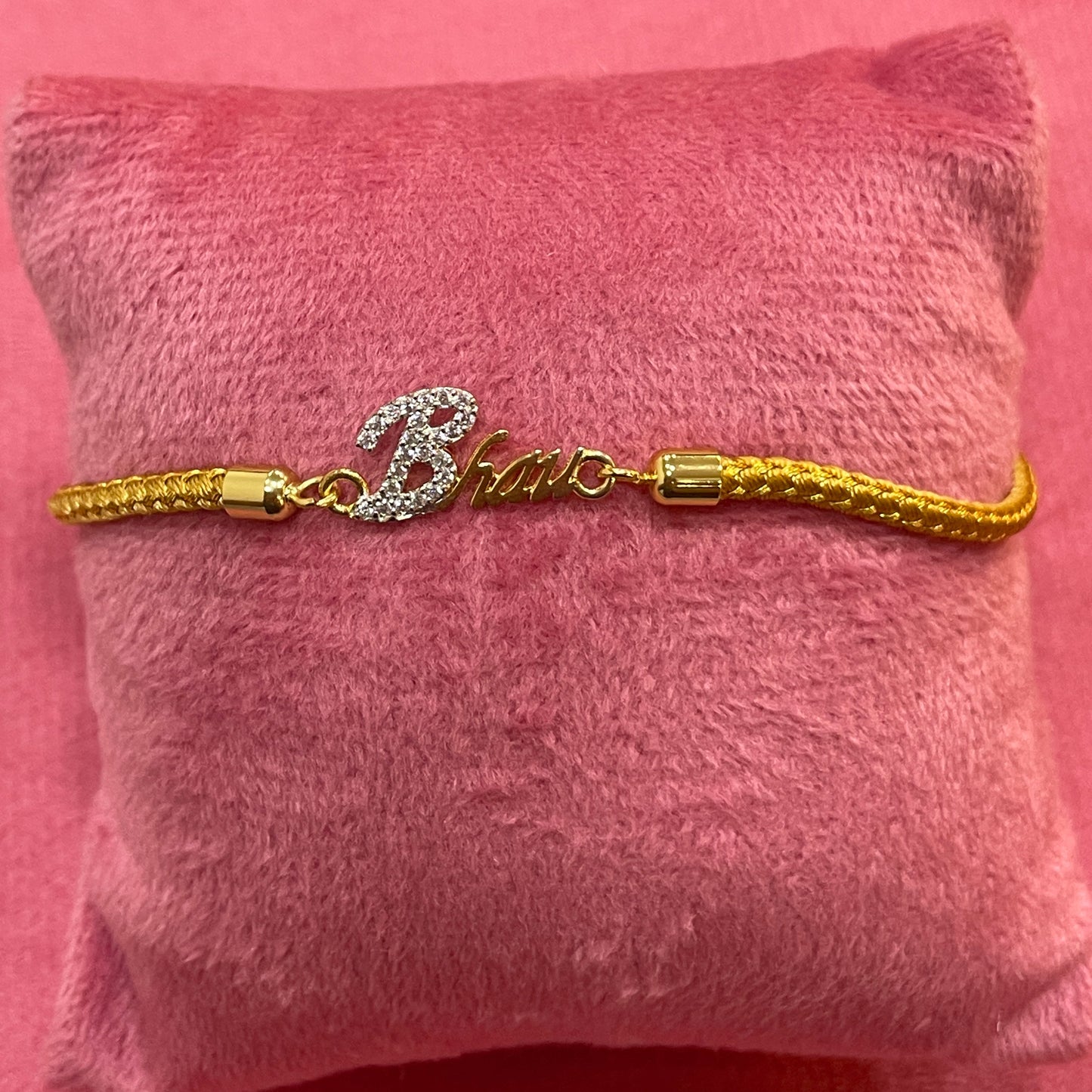 Gold-Plated Bhaiya Name Rakhi for Brother | CZ Script Charm on Gold Thread