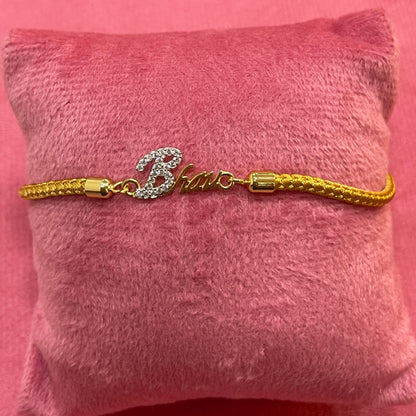 Gold-Plated Bhaiya Name Rakhi for Brother | CZ Script Charm on Gold Thread