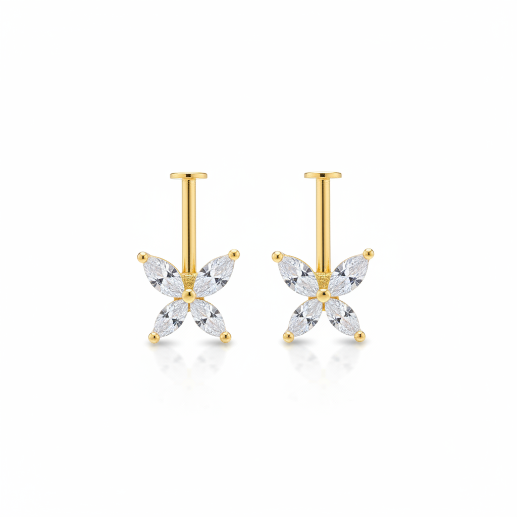 Gold butterfly-shaped bugadi earrings on a white background