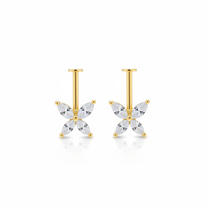 Gold butterfly-shaped bugadi earrings on a white background