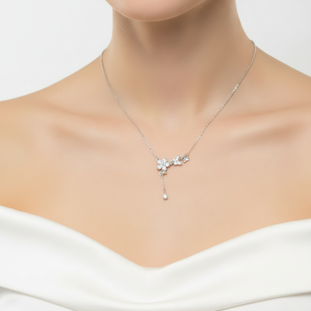Necklace with a floral pendant in a gray box on a red background