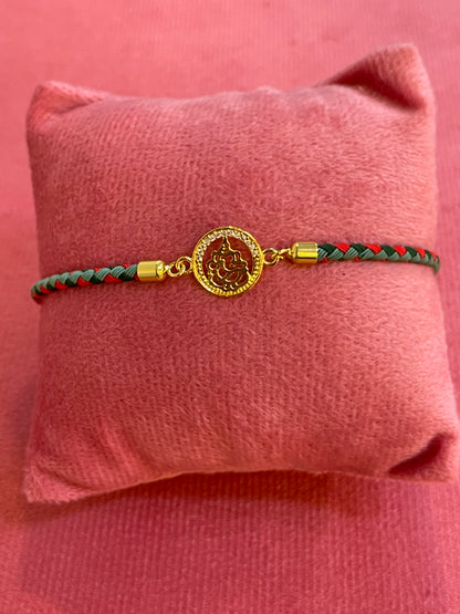 Silver Ganesha Rakhi for Brother | Gold Plated Ganesh Coin Charm on Red & Green Braided Thread