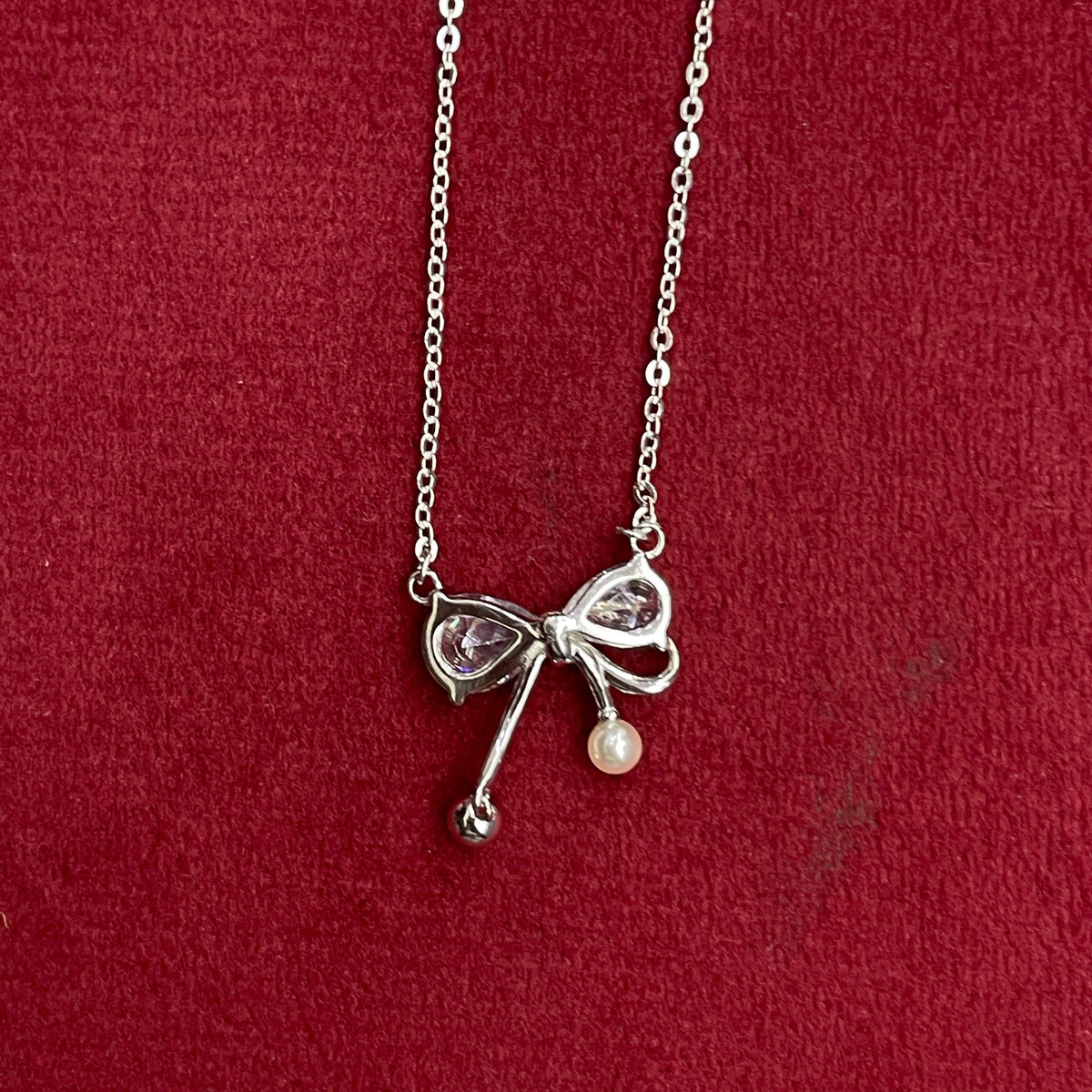 92.5 Silver Pave CZ Bow Pendant Necklace with Pearl & Silver Ball Drops for Women