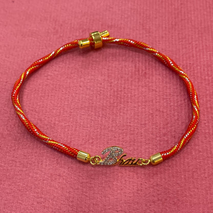 Gold-Plated Bhaiya Name Rakhi for Brother | CZ Script Charm on Red & Gold Twisted Thread