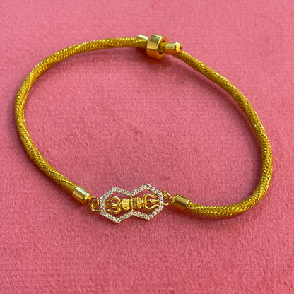 Gold Plated Rakhi for Brother | Decorative Motif Centerpiece with Golden Thread