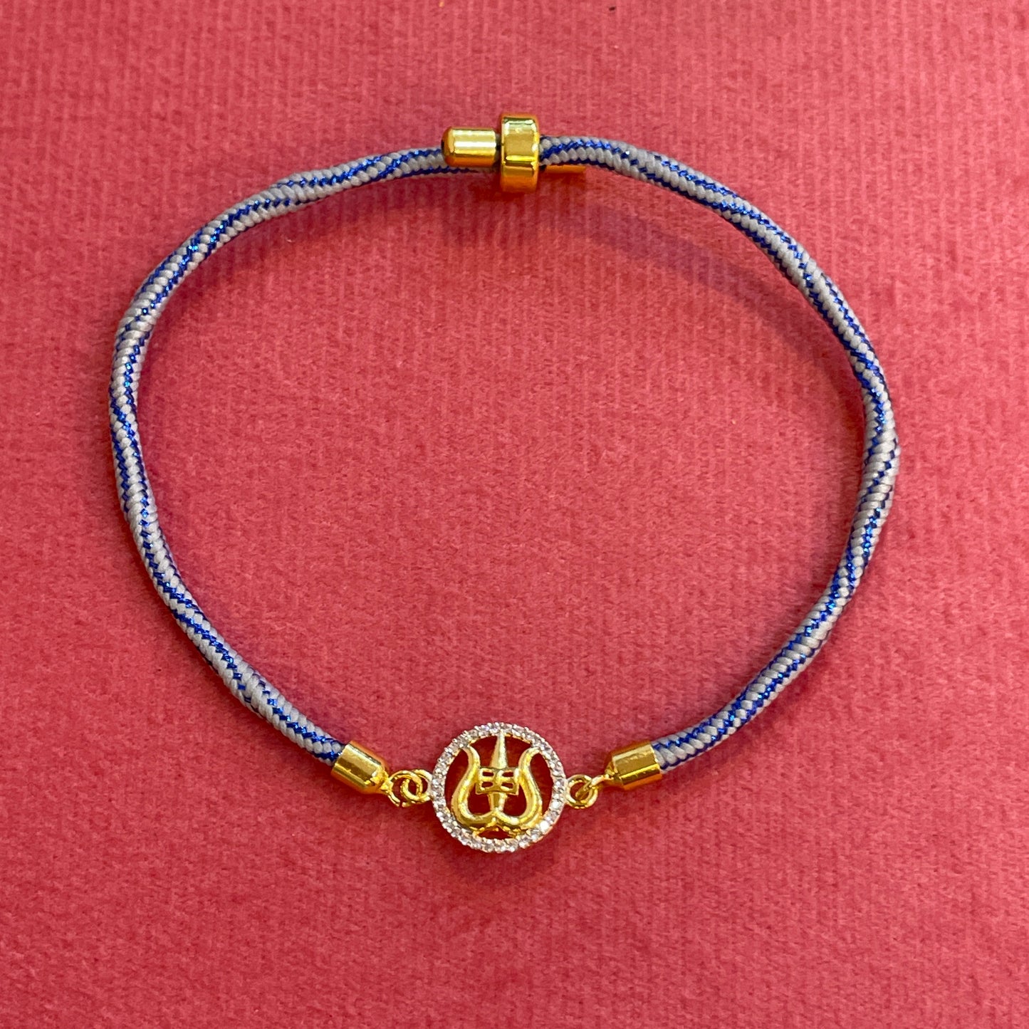 Silver Trishul Rakhi for Brother | Gold Plated CZ Charm with Blue Thread