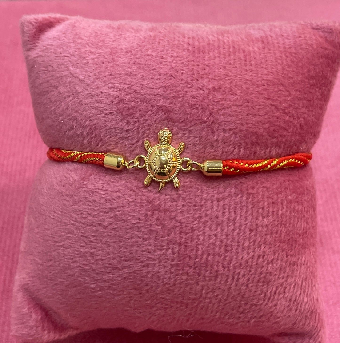 Gold-Plated Rakhi for Brother | Lucky Tortoise Charm on Red & Gold Silk Thread