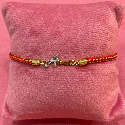 Gold-Plated Rakhi for Sister | CZ Butterfly Charm on Red Braided Silk Thread