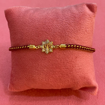 925 Silver Trishul Rakhi for Brother | Gold Plated Floral CZ Charm on Maroon Thread