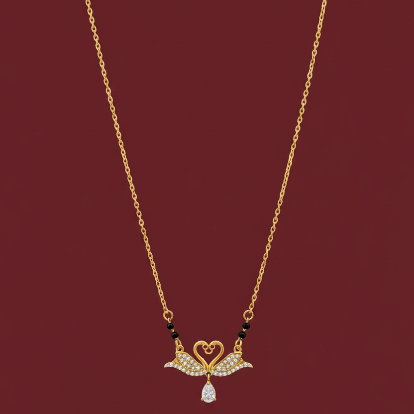 Gold necklace with a decorative pendant on a red velvet background