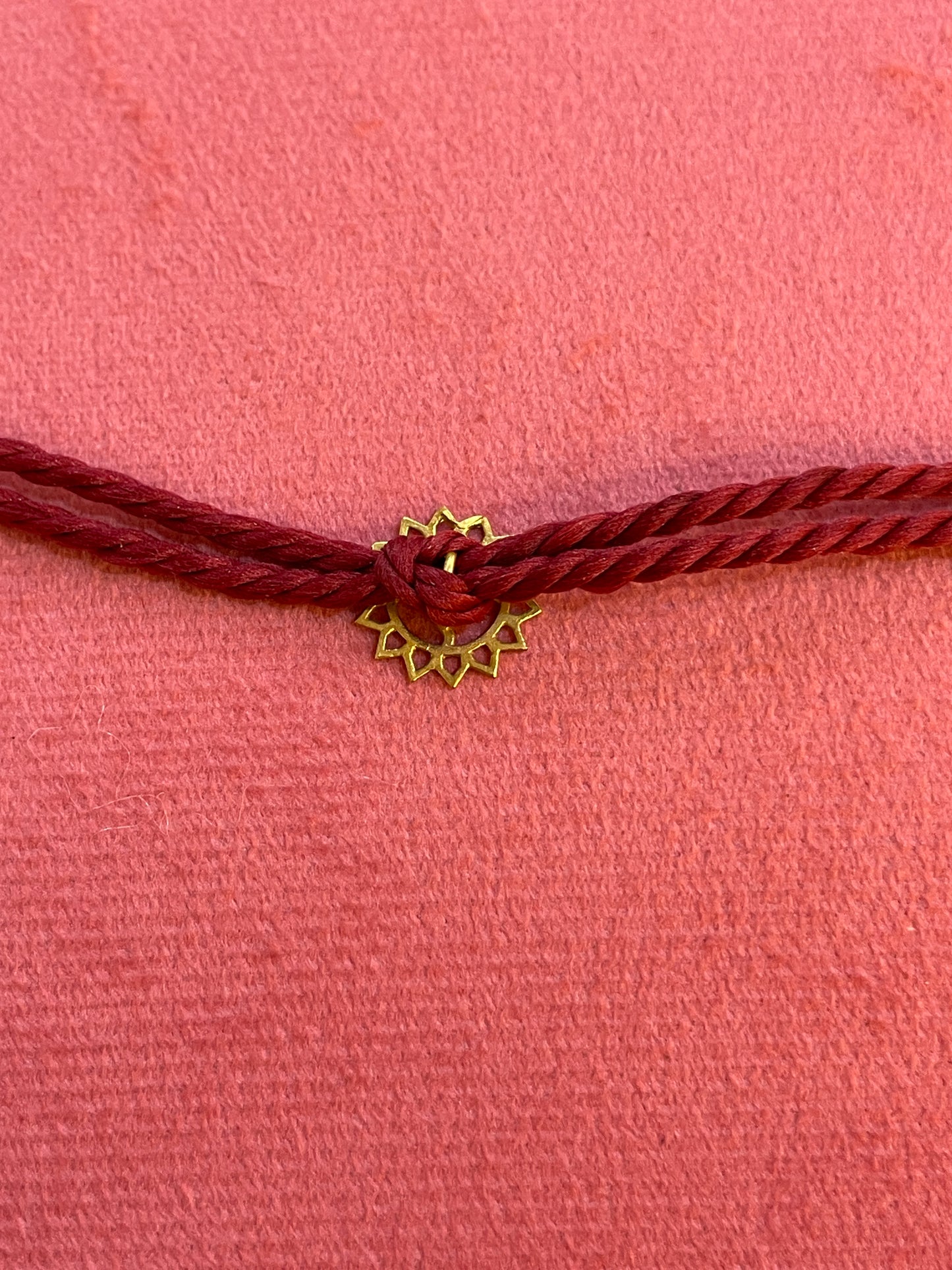 Gold Plated Swastik Rakhi for Brother | Silver Charm with Maroon Thread