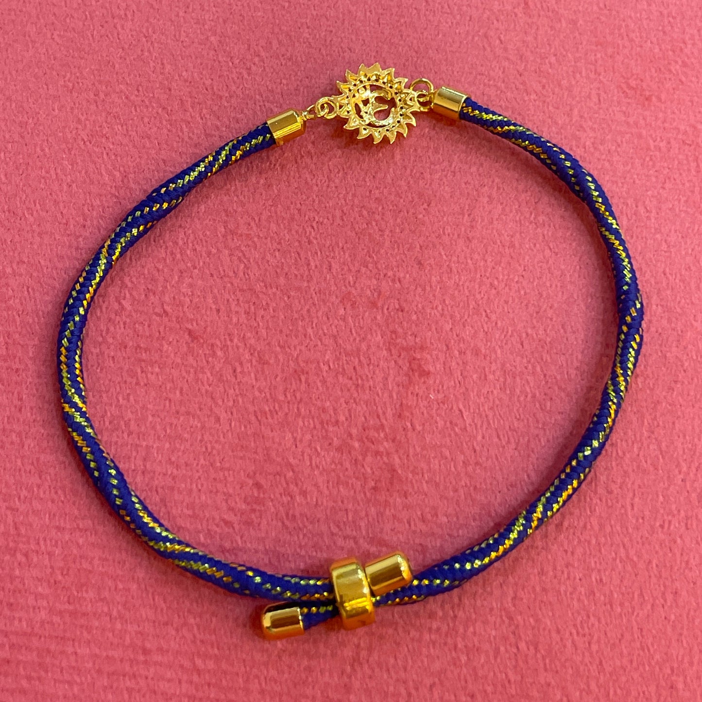 925 Silver Om Sun Rakhi for Brother | Gold Plated Charm on Royal Blue Thread