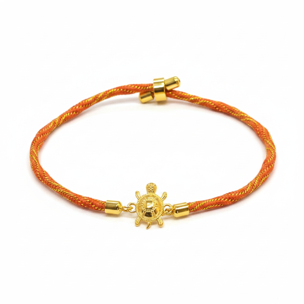 Gold-Plated Rakhi for Brother | Lucky Tortoise Charm on Orange Silk Thread