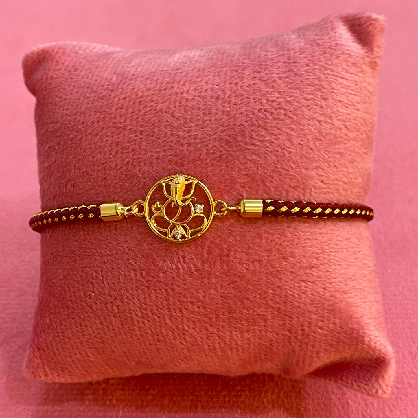 925 Silver Ganesha Rakhi for Brother | Gold Plated Circular Charm on Maroon Thread