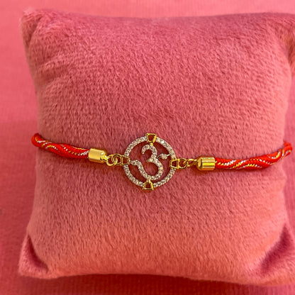 Silver Om Rakhi for Brother | Gold Plated Full CZ Om Charm on Red & Gold Twisted Thread