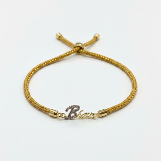 Gold-Plated Bhaiya Name Rakhi for Brother | CZ Script Charm on Gold Thread