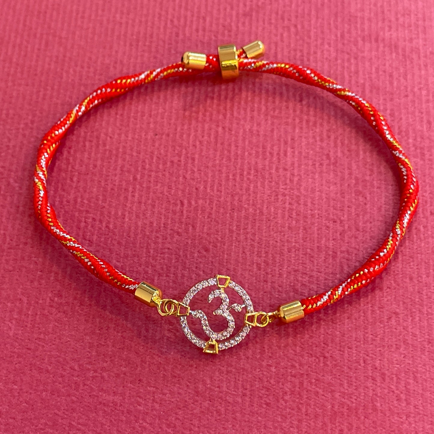 Silver Om Rakhi for Brother | Gold Plated Full CZ Om Charm on Red & Gold Twisted Thread