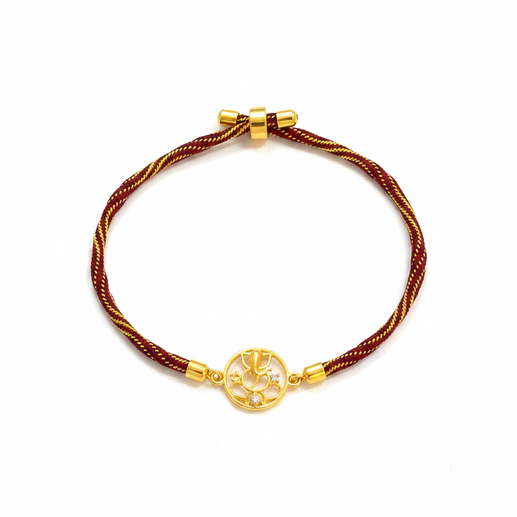 Gold Plated Ganesha Rakhi for Brother | Circular Cutwork Motif with Maroon Thread