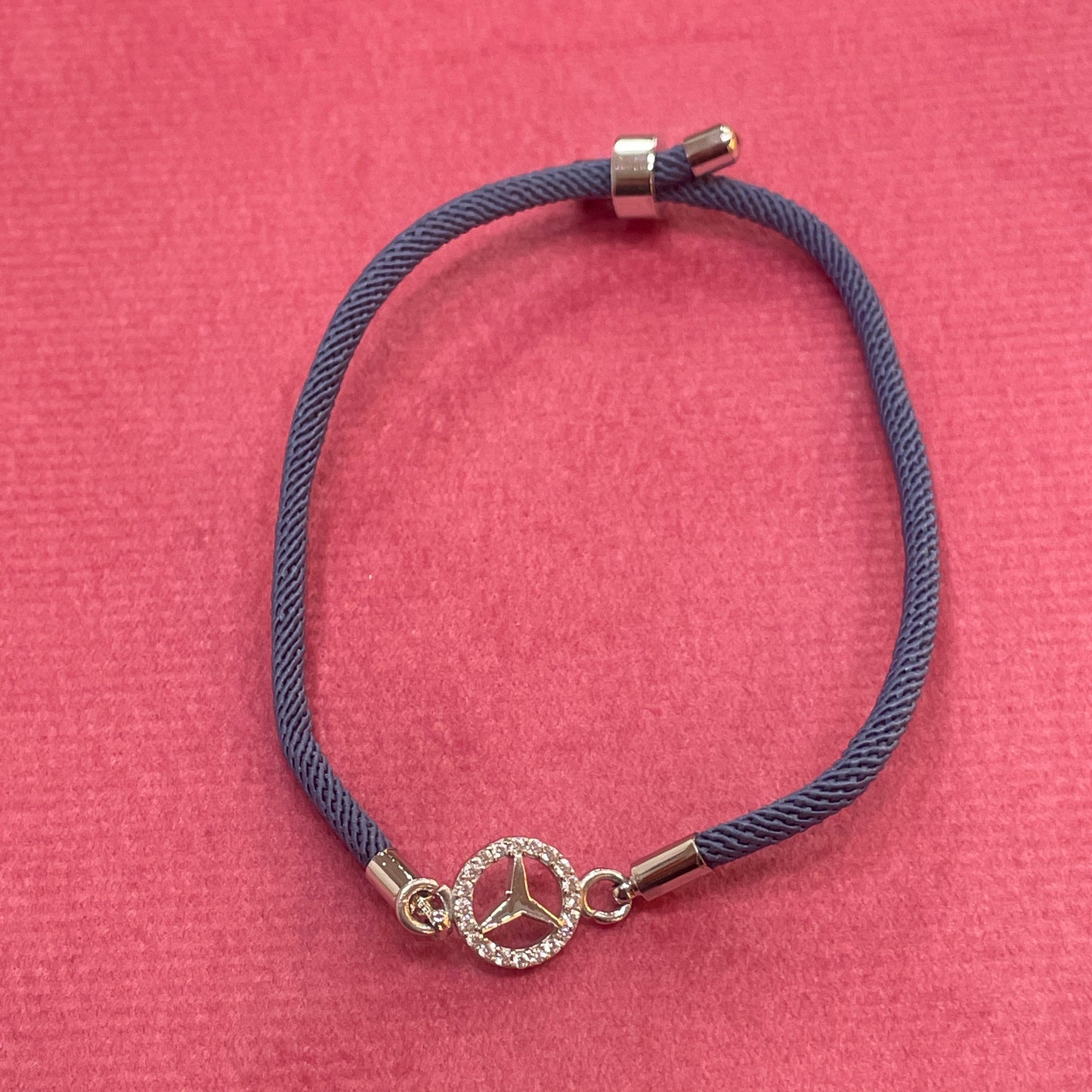 Silver-Plated Rakhi for Brother | CZ Mercedes Logo Charm on Navy Blue Silk Thread