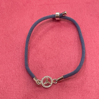 Silver-Plated Rakhi for Brother | CZ Mercedes Logo Charm on Navy Blue Silk Thread