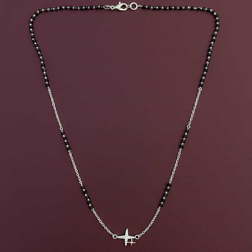 Necklace with a star pendant on a red fabric background