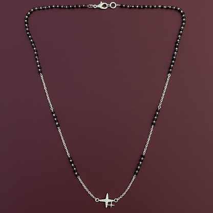 Necklace with a star pendant on a red fabric background
