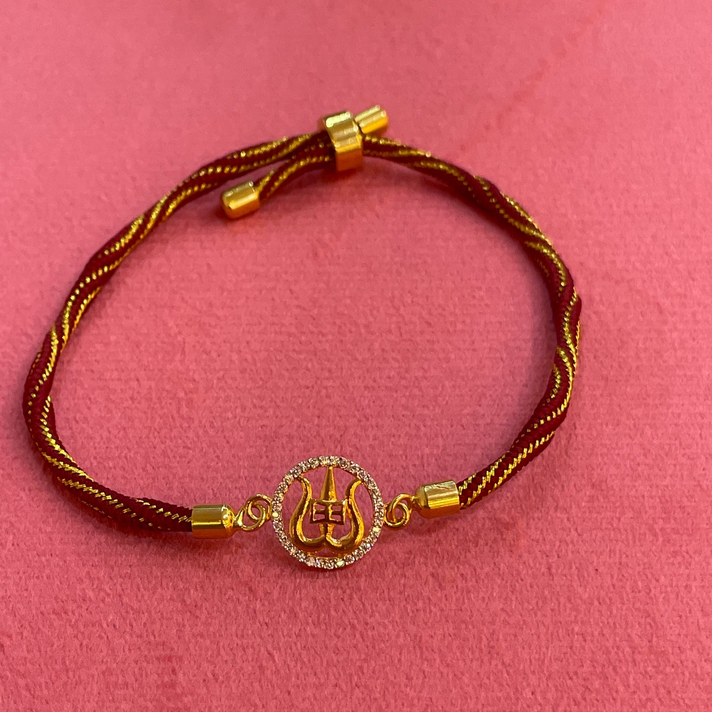 Silver Trishul Rakhi for Brother | Mahadev Rakhi with Gold Plating & CZ Stones