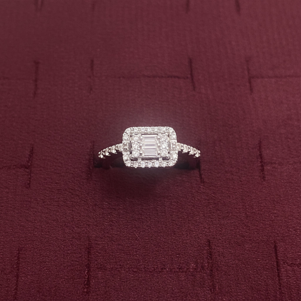 Diamond ring on a blue textured surface