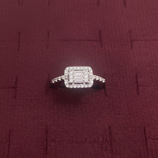 Diamond ring on a blue textured surface
