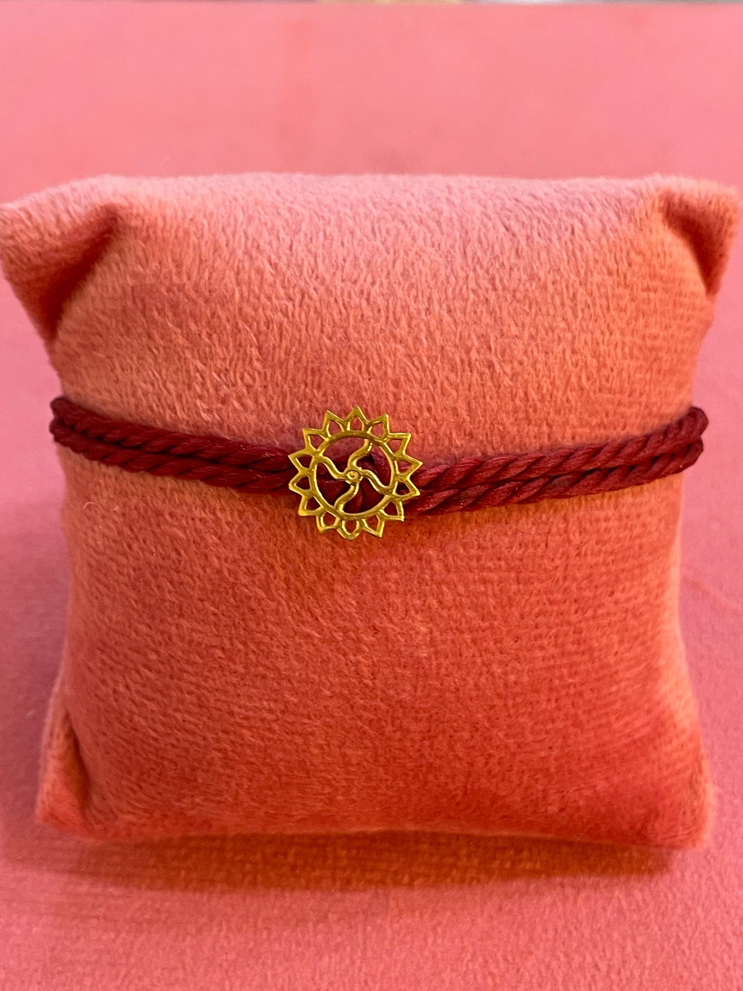 Gold Plated Swastik Rakhi for Brother | Silver Charm with Maroon Thread