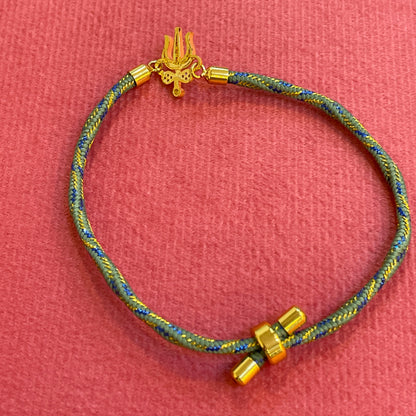 Silver Trishul Rakhi for Brother | Gold Plated Trishul Charm with CZ Stones on Teal Thread