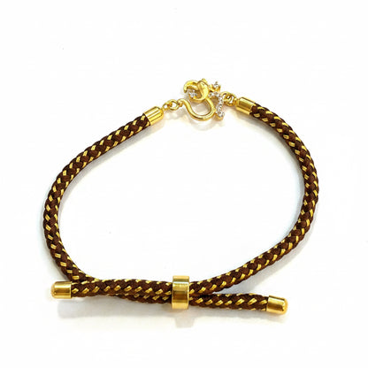 Silver Om Rakhi for Brother | Gold Plated Om Clasp on Brown & Gold Braided Thread