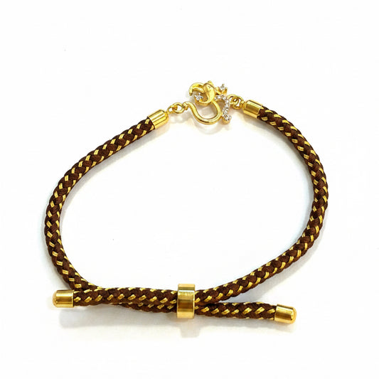 Silver Om Rakhi for Brother | Gold Plated Om Clasp on Brown & Gold Braided Thread