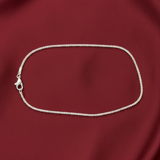 Red fabric with a white string on a red background