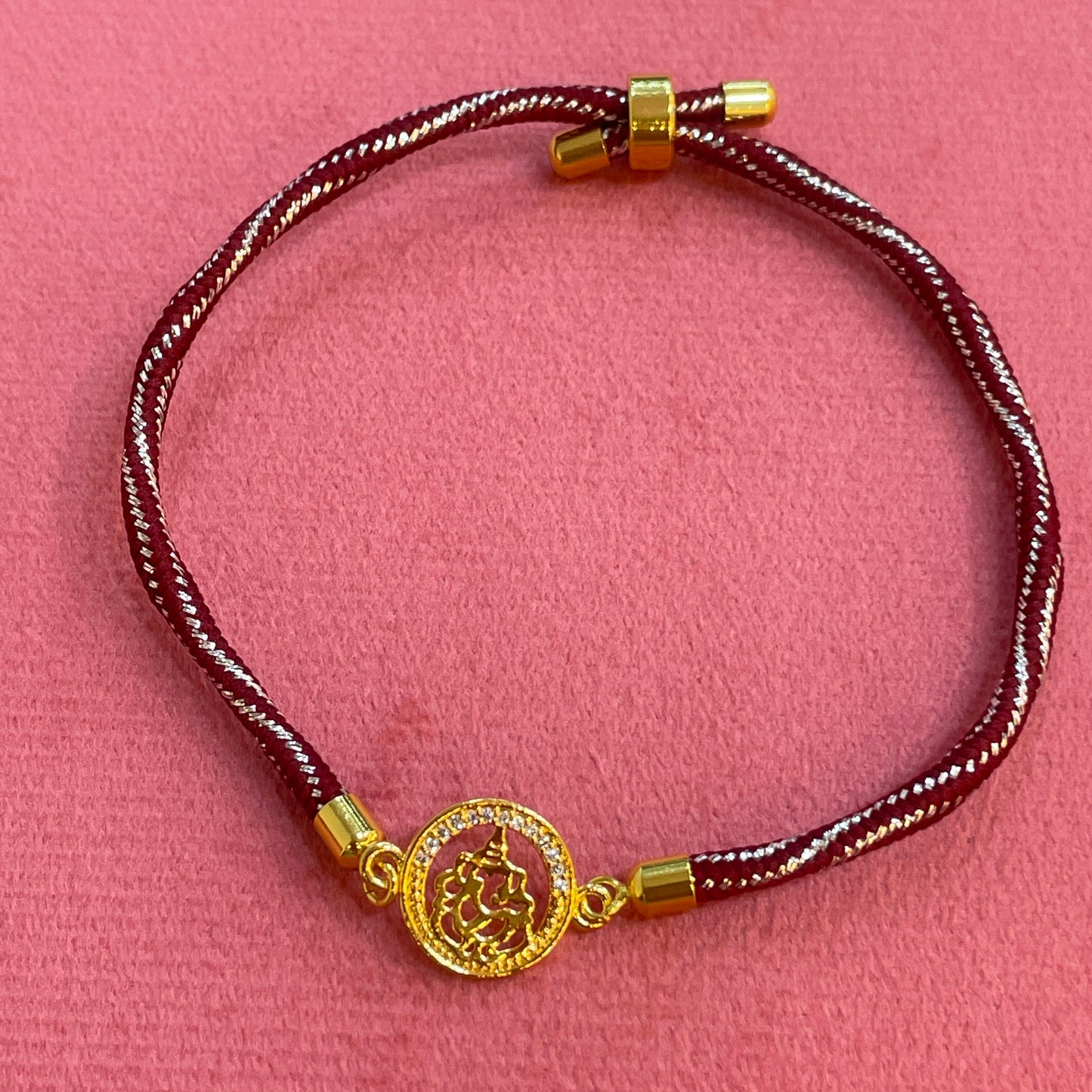 925 Silver Ganesha Rakhi for Brother | Gold Plated CZ Halo Circular Charm on Maroon Thread