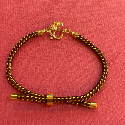 Silver Om Rakhi for Brother | Gold Plated Om Clasp on Brown & Gold Braided Thread