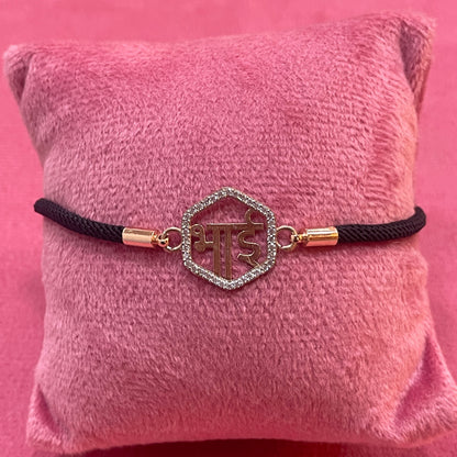 Rose Gold-Plated Rakhi for Brother | CZ Hexagon Bhai Script Charm on Black Silk Thread