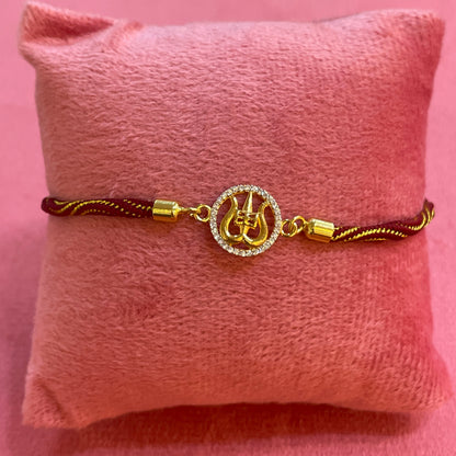 Silver Trishul Rakhi for Brother | Mahadev Rakhi with Gold Plating & CZ Stones