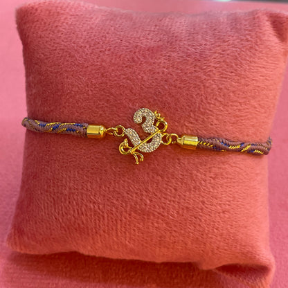 925 Silver Om Rakhi for Brother | Gold Plated CZ Om Charm on Grey Blue Thread