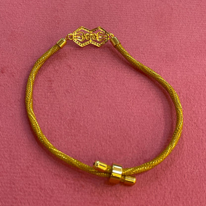Gold Plated Rakhi for Brother | Decorative Motif Centerpiece with Golden Thread