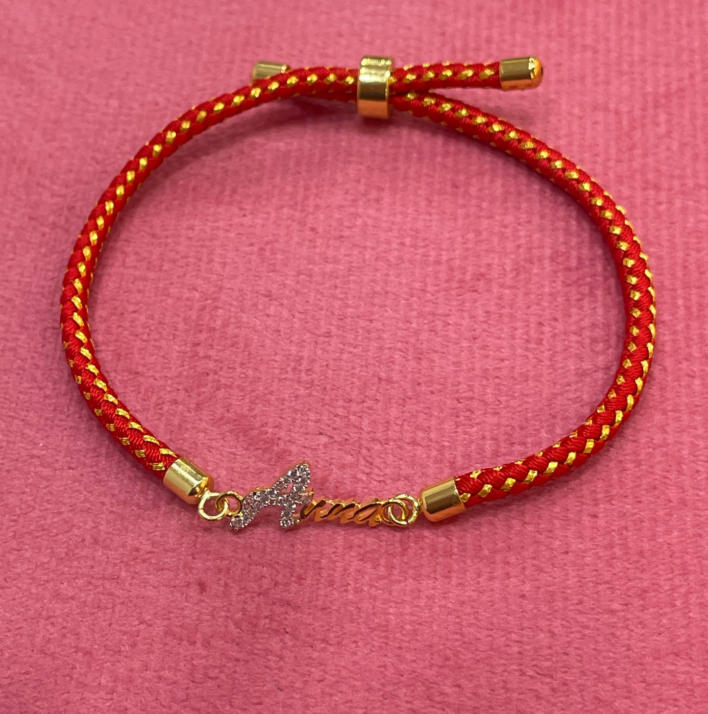 Gold-Plated Rakhi for Sister | CZ Butterfly Charm on Red Braided Silk Thread