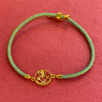 Silver Ganesha Rakhi for Brother | Gold Plated Ganesh Charm with CZ Stones on Teal Thread