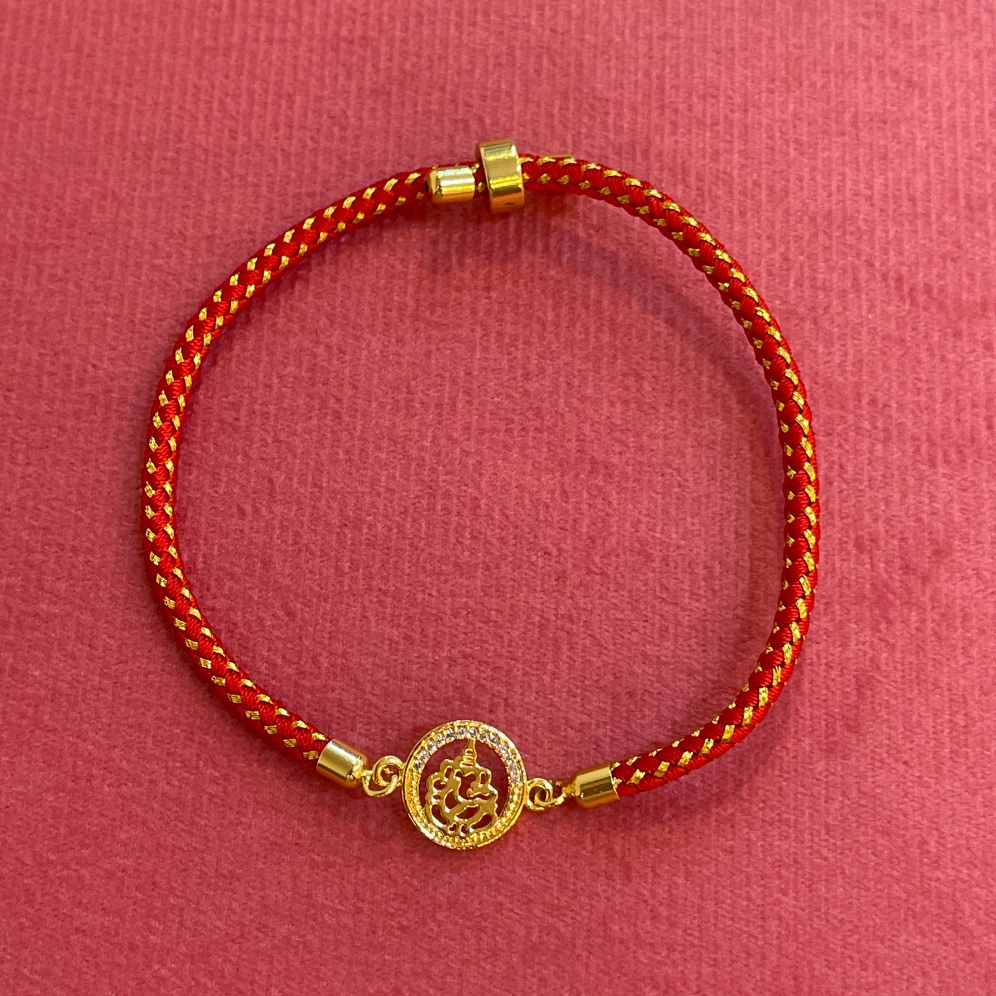 Silver Ganesha Rakhi for Brother | Gold Plated CZ Circular Charm with Red Thread