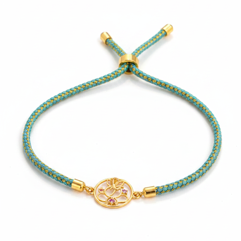 Silver Ganesha Rakhi for Brother | Gold Plated Ganesh Charm with CZ Stones on Teal Thread